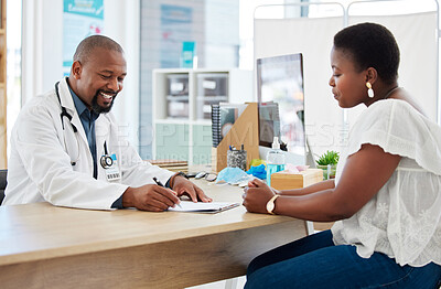 Buy stock photo Doctor, writing on clipboard and consultation with black woman for health checkup. Healthcare, paperwork and happiness of medical professional with patient, checklist and results in hospital clinic.
