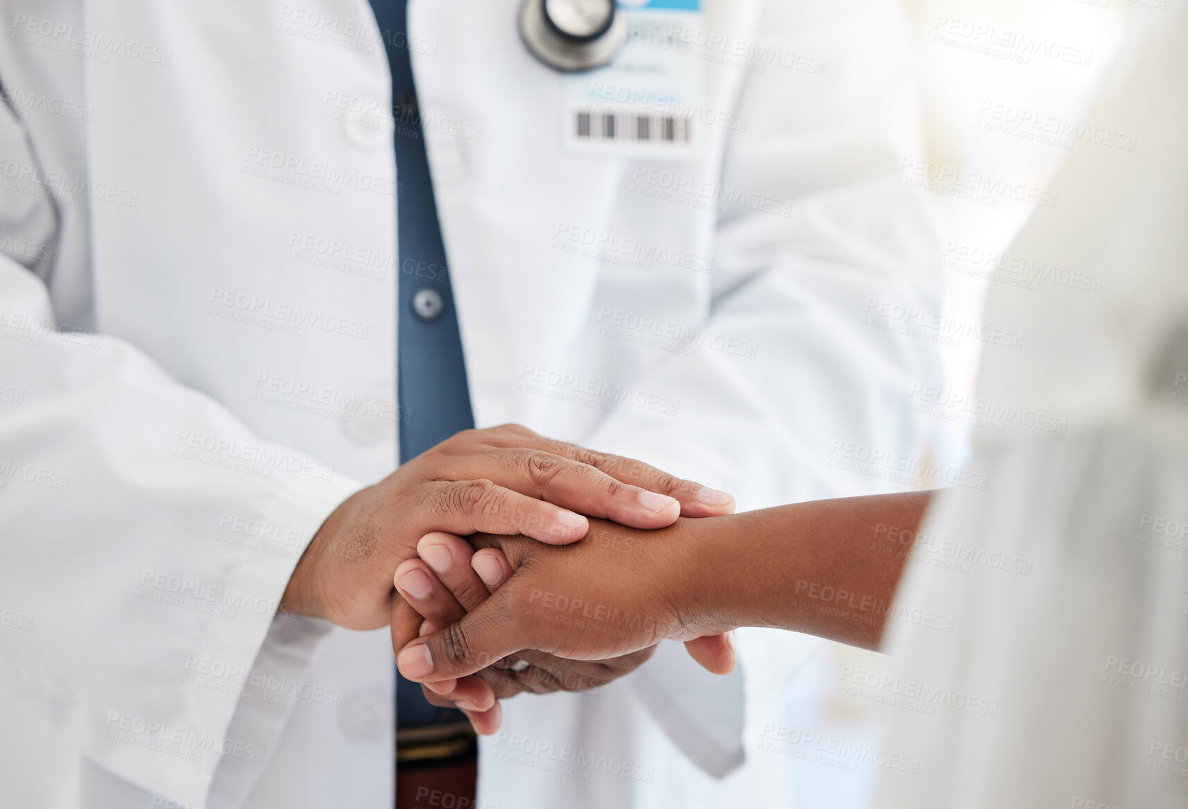 Buy stock photo Healthcare, hands and doctor comforting a patient after a diagnosis at a consultation in the hospital. Wellness, compassion and male medical worker with empathy for a woman in a medicare clinic.