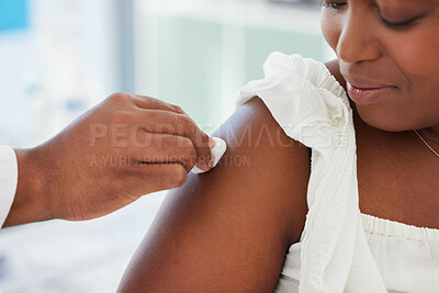Buy stock photo Doctor cleaning the patient arm before an injection in a consultation room in the hospital. Healthcare, hygiene and hand of medical worker wipe the skin before a vaccine in a medicare clinic.