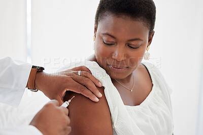 Buy stock photo Hand, covid vaccine and a black woman with her doctor in the hospital for an injection of medicine antibiotics. Healthcare, medical or consulting with a male healthcare professional holding a syringe