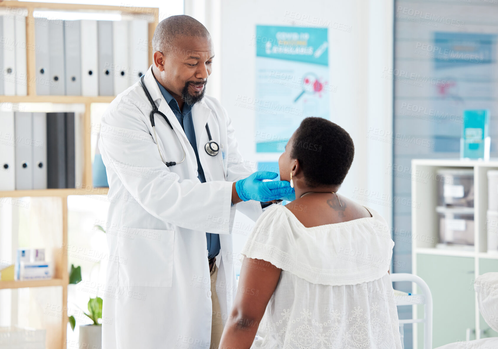 Buy stock photo Black man, senior doctor and patient with sore throat, medical examination, consultation in hospital and healthcare. Communication, woman and man check tonsils with medicine professional and health