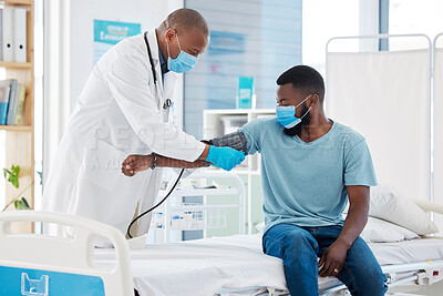 Buy stock photo Doctor, covid and blood pressure with black man for heart health, test and examination. Face mask, hypertension and patient, medical professional and sphygmomanometer for consultation in clinic