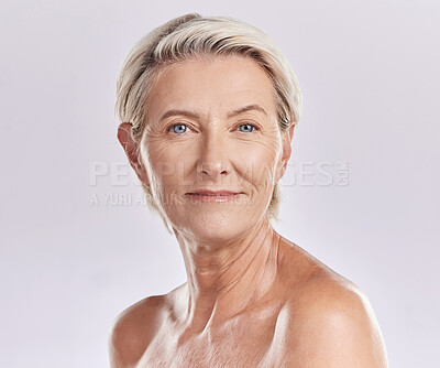 Buy stock photo Beauty, skincare and wellness with a senior woman in studio isolated against a grey background. Face portrait of health, skin care and natural body with a female looking happy, perfect and confident