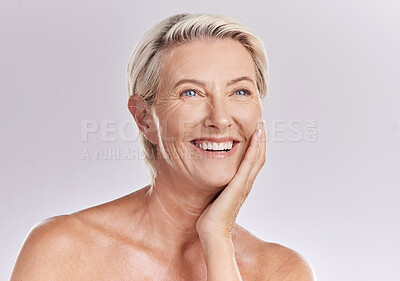 Buy stock photo Skincare, grooming and beauty with a mature woman happy with her skin after a facial or treatment. Senior female feeling confident and relaxed, enjoying selfcare routine and healthy, natural texture