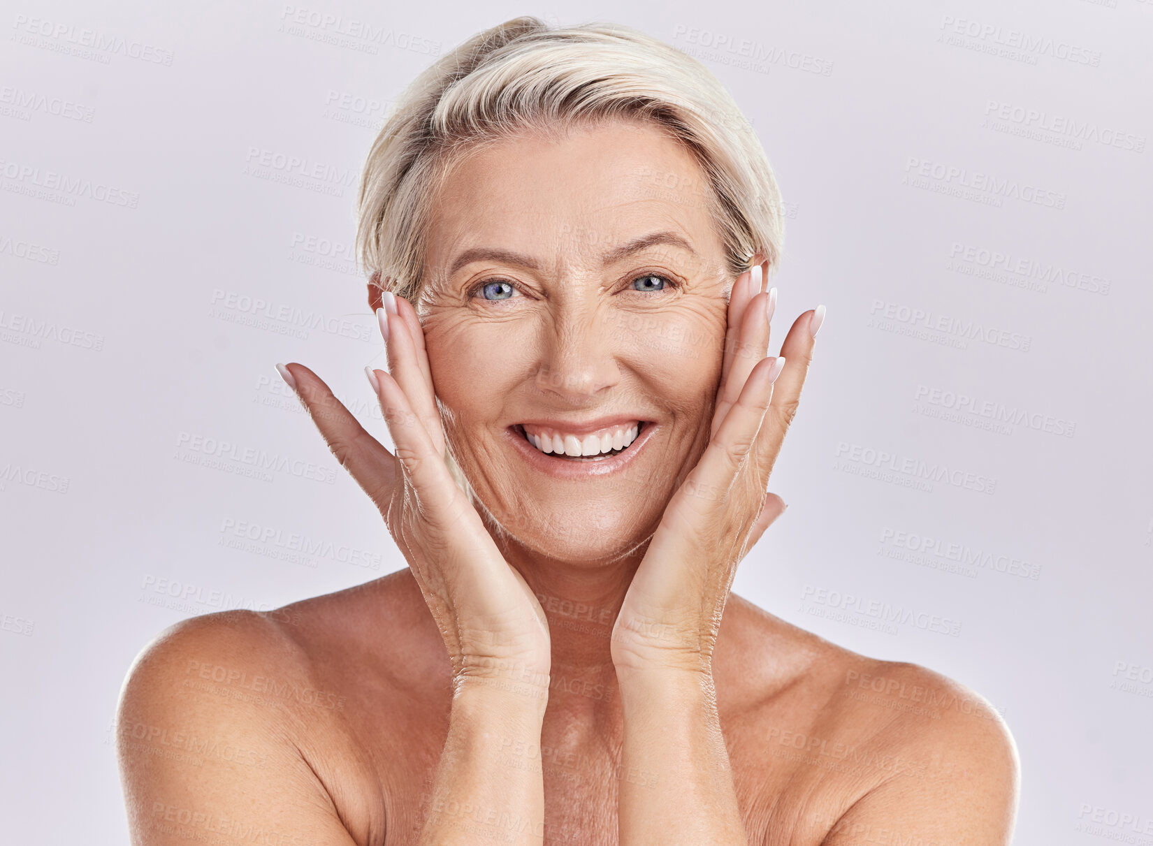 Buy stock photo Portrait of a woman happy face smile with healthy skincare while posing in a studio against purple mockup studio background. Elderly woman doing her wellness skin cosmetic treatment routine