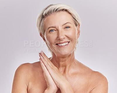 Buy stock photo Soft skin, antiaging or wrinkle free senior woman looking happy with her skincare, hygiene and beauty nighttime or bedtime routine. Beautiful, wellness model portrait in studio with perfect skin care