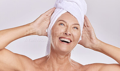 Buy stock photo Thinking, senior or happy woman with beauty, towel or smile in studio isolated on white background. Dermatology, joy or mature lady with natural facial skincare cosmetics or glowing shine in spa 