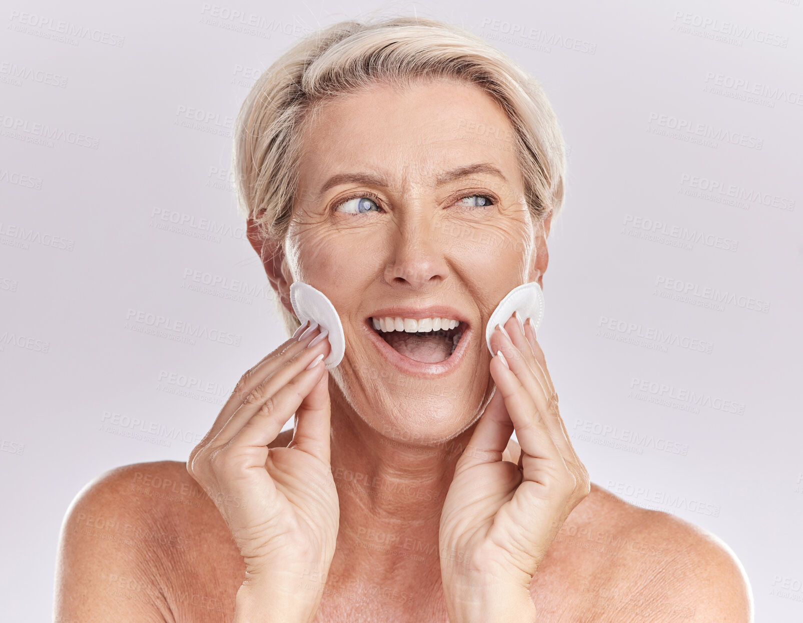 Buy stock photo Senior woman skincare and face with product remover and makeup cleaning or beauty model with cosmetic cotton pads on studio mockup background. Happy woman face, headshot and wrinkles or skin care 