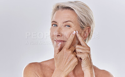 Buy stock photo Acne or pimple popping female or woman after night face skincare beauty treatment for healthy and clear skin copy space. Portrait of happy senior woman use cosmetics with hands to target wrinkles