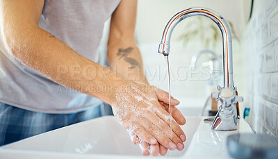 Buy stock photo Soap, water and man washing hands at tap for skincare, healthy dermatology and safety of bacteria at home. Closeup, person and cleaning palm with foam at basin for hygiene routine, wellness or habit
