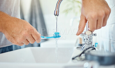 Buy stock photo Hands, toothbrush and person at tap for water, dental hygiene and gum care at home. Closeup, brushing teeth and rinse oral product for fresh grooming, morning routine and cleaning at bathroom sink