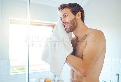 Buy stock photo Man, cleaning face and towel in bathroom with smile, self care and hygiene to start morning in home. Young guy, person and cloth for beauty, facial cosmetics or wellness for beard, skincare and house