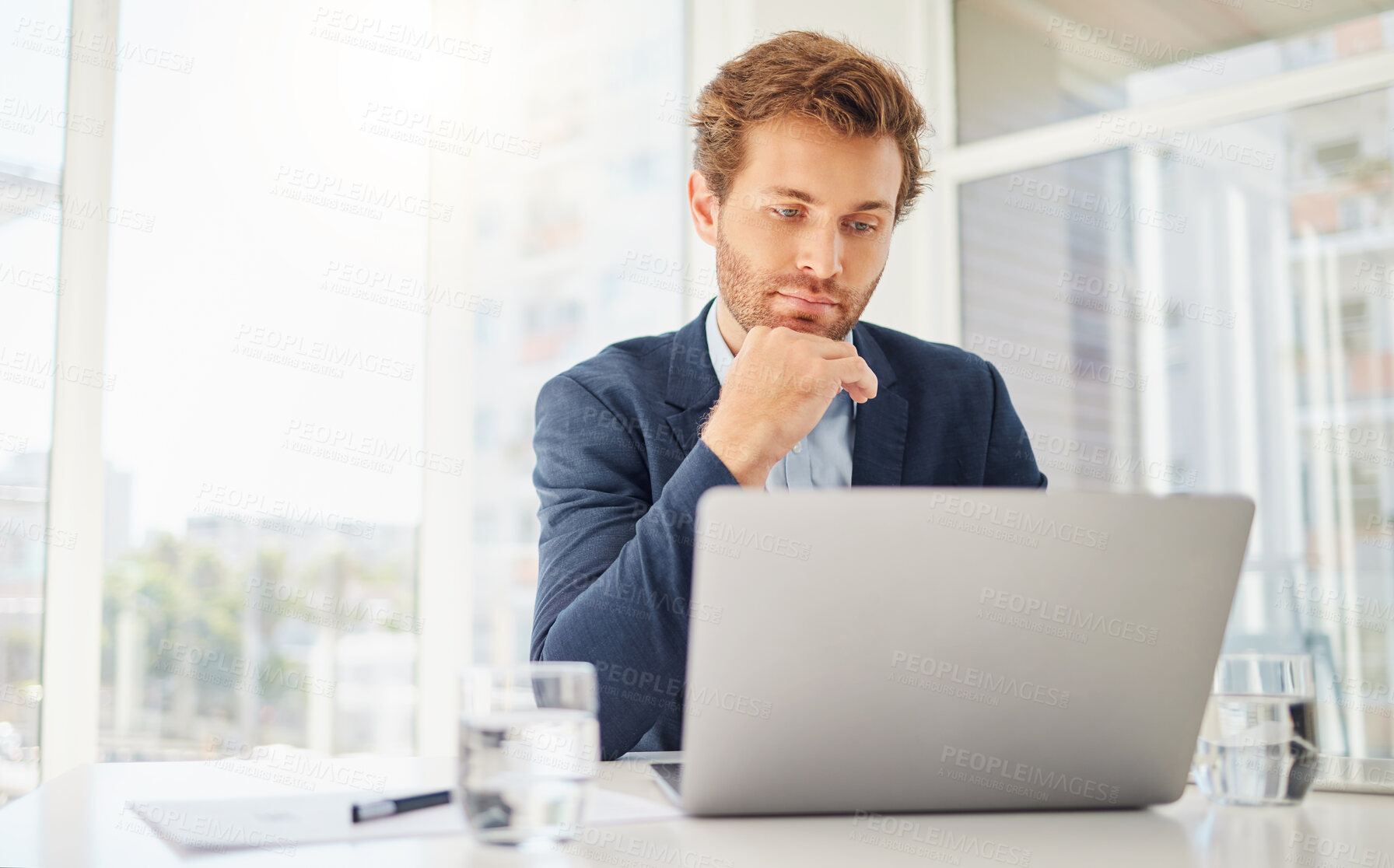 Buy stock photo Thinking, laptop and business man in office for focus, research and planning. Communication, technology and internet with male employee contemplating for website, project idea and connection