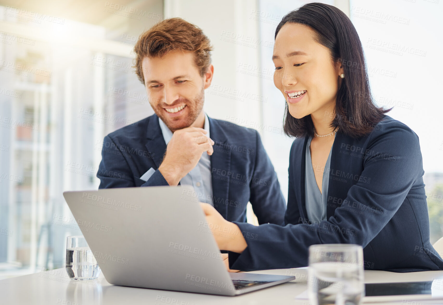 Buy stock photo Business man, woman and laptop for discussion, reading and planning with web research in office. Japanese businesswoman, businessman and computer for diversity, teamwork or collaboration at meeting