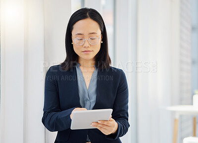Buy stock photo Office, tablet and Asian business woman typing workplace report, online project feedback or analysis of corporate data. Professional administration, reading and person working in Japanese company HQ