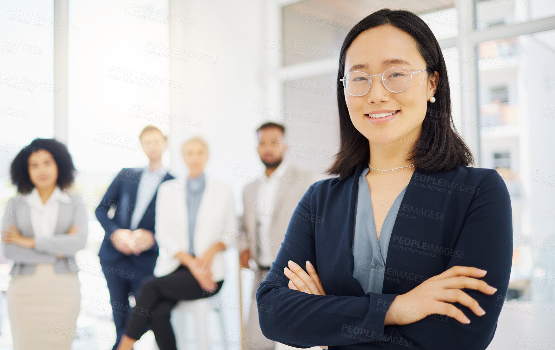 Buy stock photo Business, happy and portrait of Asian woman in office with confidence, pride and motivation with team. Leadership, diversity and female worker with smile for success, company mission and happiness