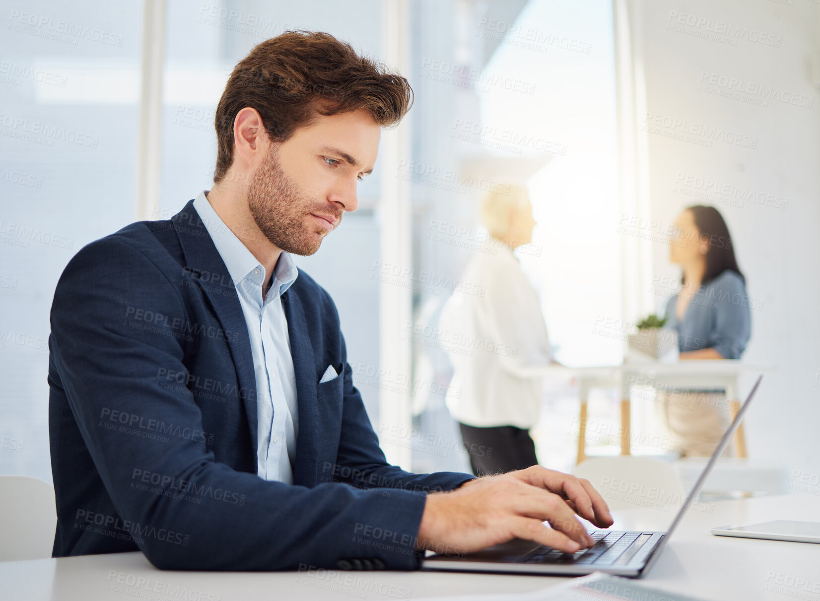 Buy stock photo Serious, thinking and business man working on a laptop in a office with website data and planning. Entrepreneur, management worker and online database analyst typing on a computer for a web update