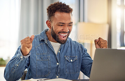 Buy stock photo Excited businessman working from home on his laptop cheering. Young businessman doing virtual remote work from home. Entrepreneur cheering after his luck with work. Freelance worker at home