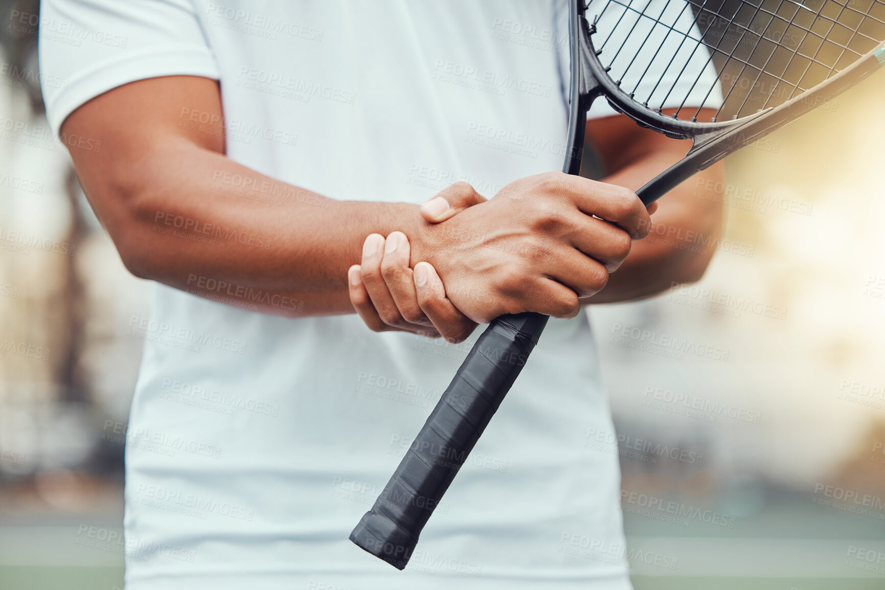 Buy stock photo Tennis court, hand injury and man with racket for sports, fitness and match with discomfort or bruise. Joint pain, wrist and male player with arthritis, osteoporosis or fibromyalgia during training