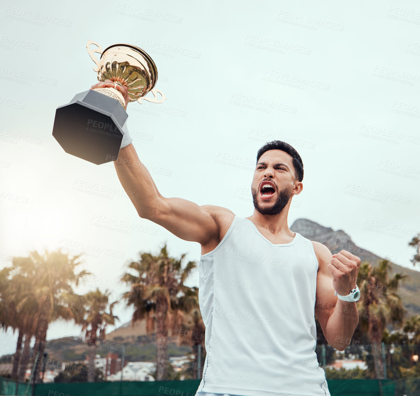 Buy stock photo Happy man, trophy and tennis celebration for winning, success or victory achievement on the court. Male person, winner or champion with fist holding award, prize or reward in win, competition or goal
