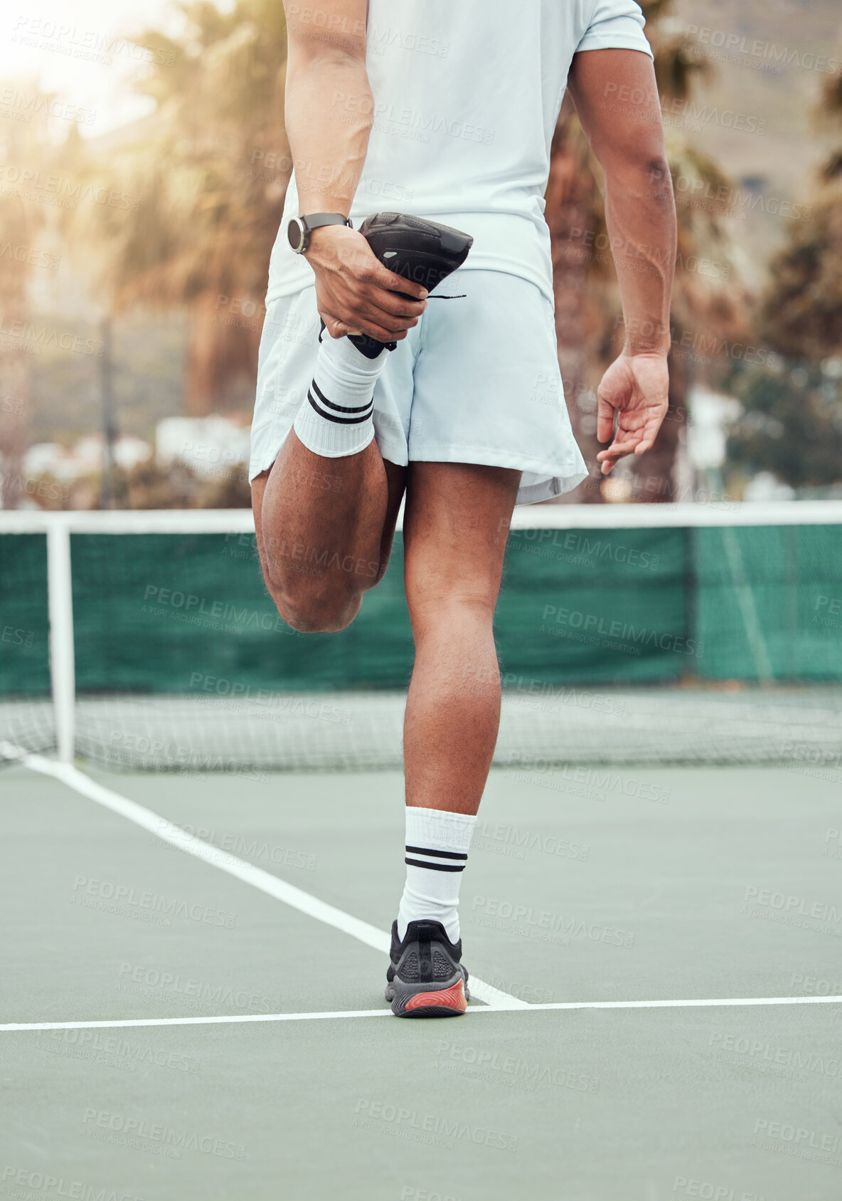 Buy stock photo Man, hands and stretching legs on tennis court getting ready for match or game in the outdoors. Fit and active male person or sport player in warm up leg stretch for workout, exercise or training