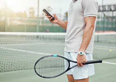 Buy stock photo Man, hands and phone on tennis court for social media, communication or chatting in sports for match or game. Hand of male person or player holding racket texting on mobile smartphone for online chat