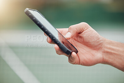 Buy stock photo Man, hands and phone on tennis court for communication, social media or networking outdoors. Closeup hand of man typing, texting or chatting on mobile smartphone, screen or display with mockup space