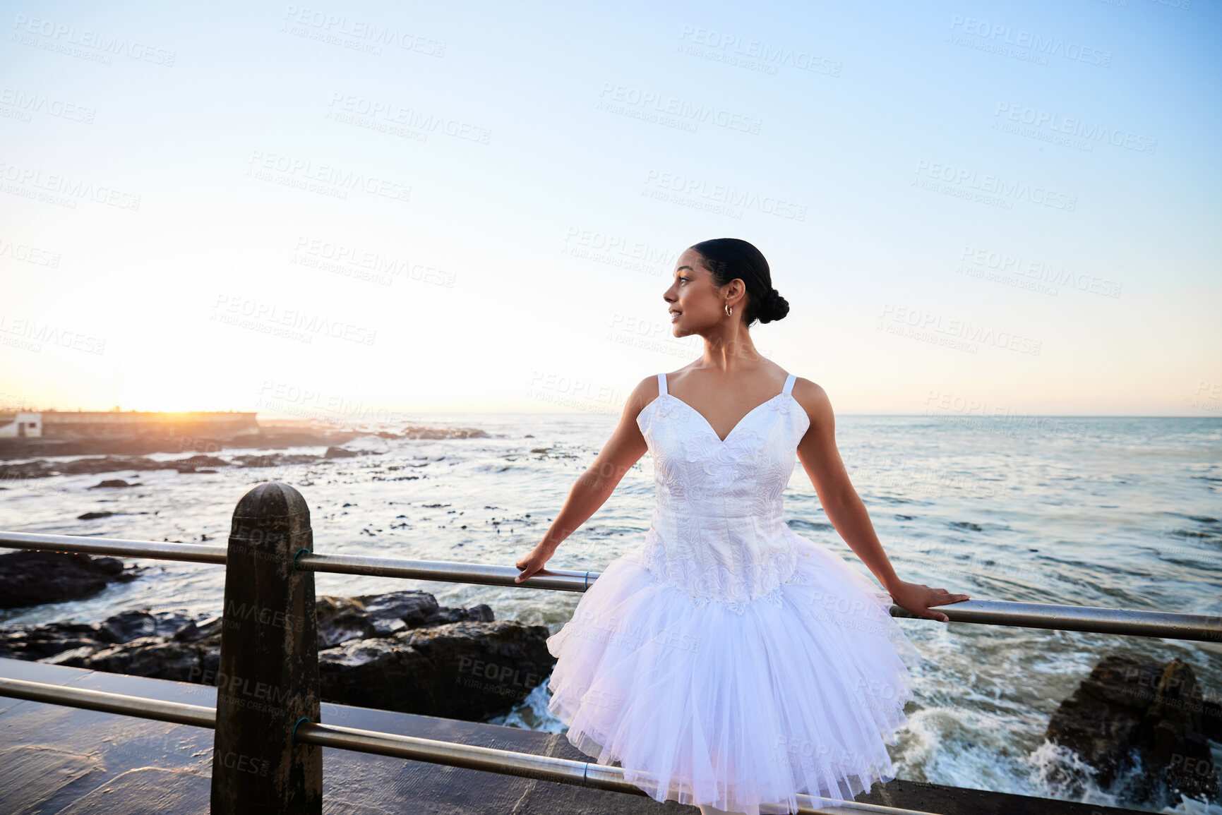 Buy stock photo Ballet, nature and woman at beach for dance, creative and peace with calm, water and commitment. Ballerina, person and fitness outdoor by ocean for aesthetic, performance and exercise as artist