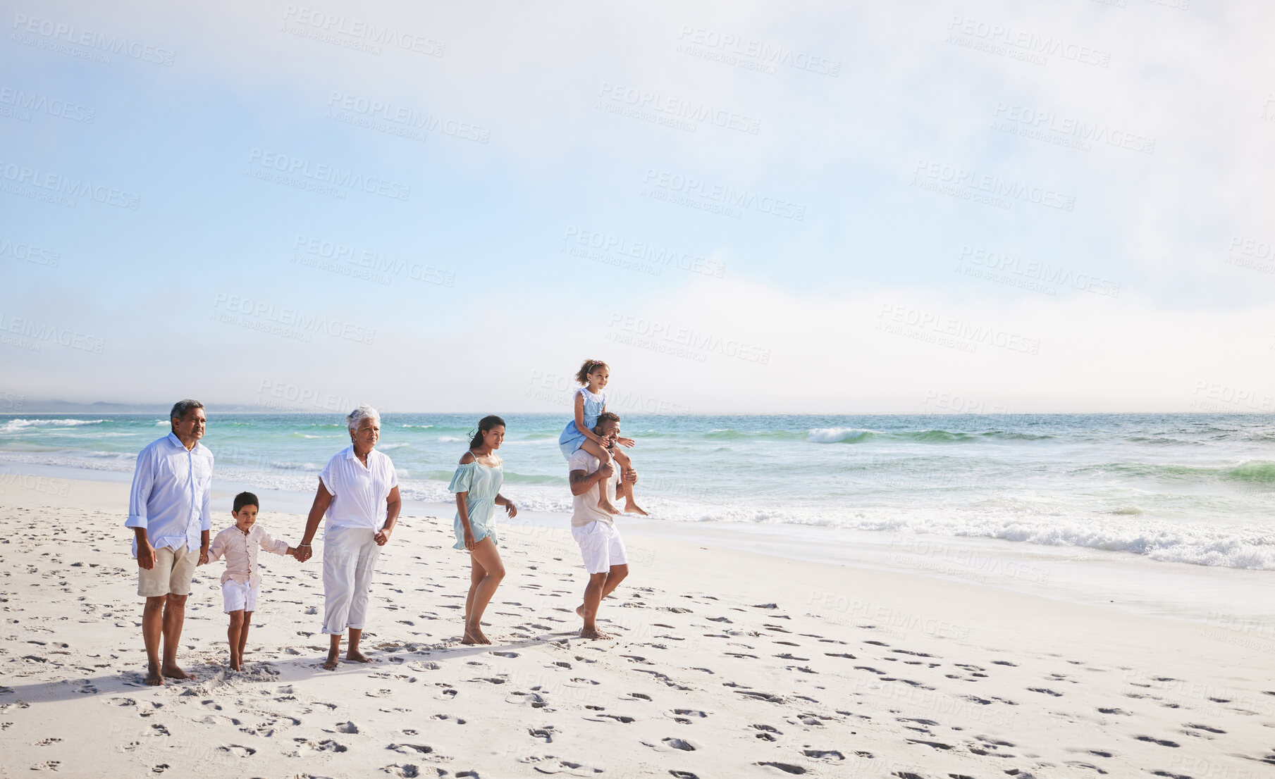 Buy stock photo Big family, grandparents walking or children on beach with young siblings holding hands on holiday together. Dad, mom or kids love bonding, smiling or relaxing with senior grandmother or grandfather