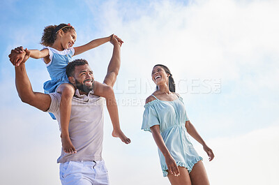 Buy stock photo Piggyback, sea or parents walking with a child for a holiday vacation together with happiness in summer. Holding hands, mother and father playing or enjoying family time with a happy girl or kid 