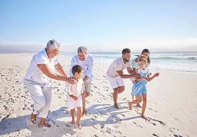 Buy stock photo Travel, holiday and big family playing on beach for running and bonding on weekend trip. Happy, excited and children having fun with their grandparents and parents by the ocean on tropical vacation.