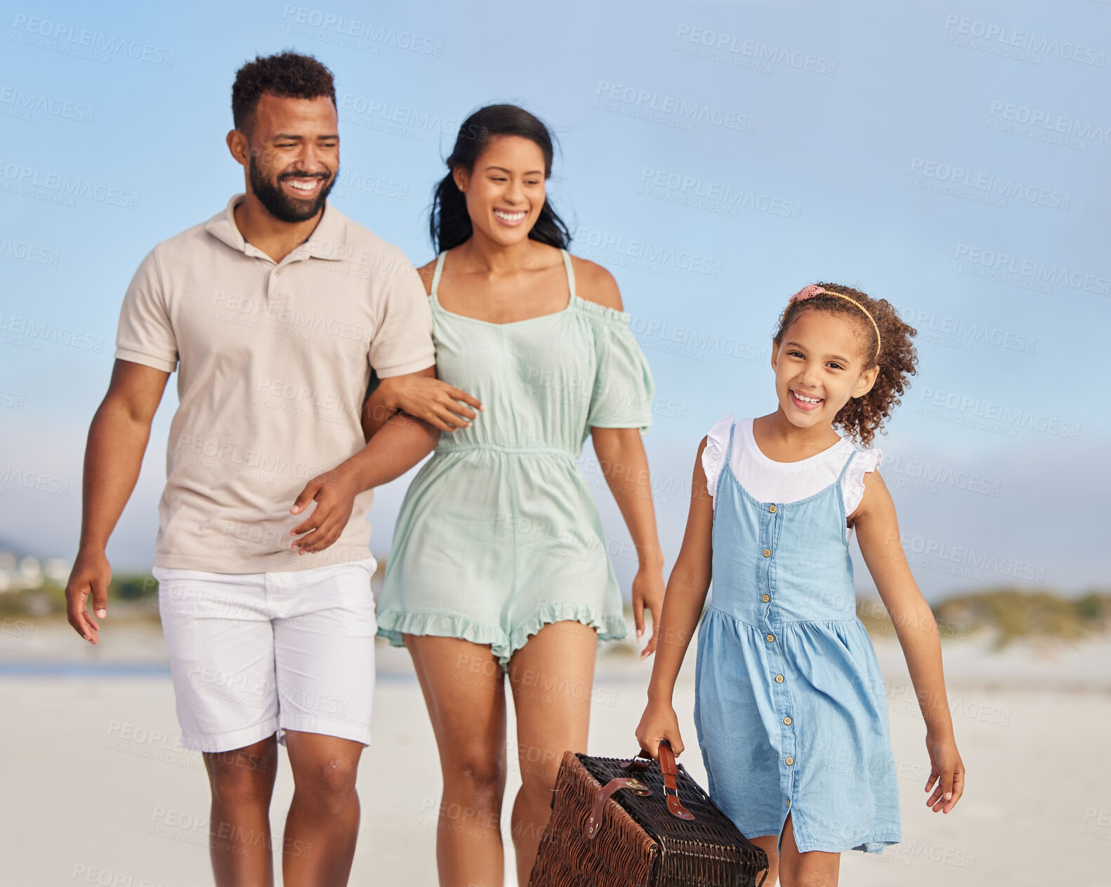 Buy stock photo Happy family, parents or girl walking on beach to relax on fun holiday vacation or picnic together. Dad, mom or excited young child bonding, smiling or holding basket outdoors in summer at seashore 