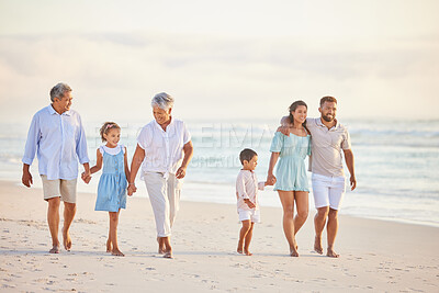Buy stock photo Family, holding hands and walk on beach, generations and people travel together, grandparents and parents with kids. Love, care and men with women and children outdoor, tourism and vacation in Mexico