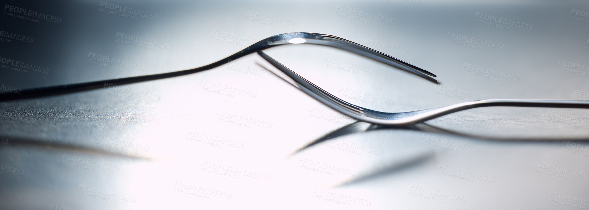 Buy stock photo Collaboration, teamwork and balance with two fork utensils together in studio on a gray background as a symbol of unity. Partnership, relationship and together with a kitchen utensil pair on a table