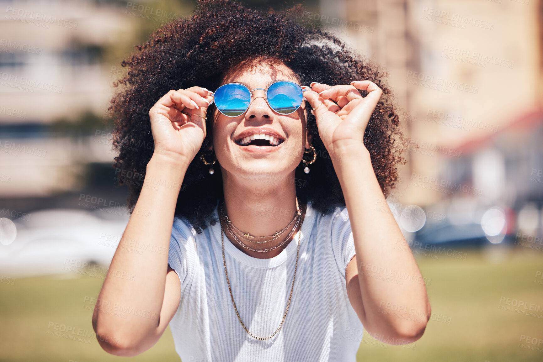 Buy stock photo Woman, fashion and sunglasses outdoor in city for happiness, summer and travel holiday. Face of african person with natural hair or afro at nature park with glasses and positive mindset for freedom