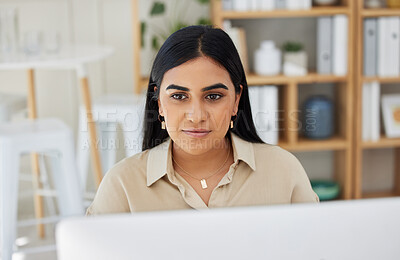 Buy stock photo Business, email or Indian woman typing on computer working on search engine or online project research. Technology, office or girl journalist writing blog reports or internet articles with focus. 