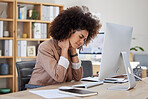 One mixed race African american businesswoman with an afro suffering from a headache while feeling exhausted and depressed at an office job. Stress and anxiety causes neck ache 