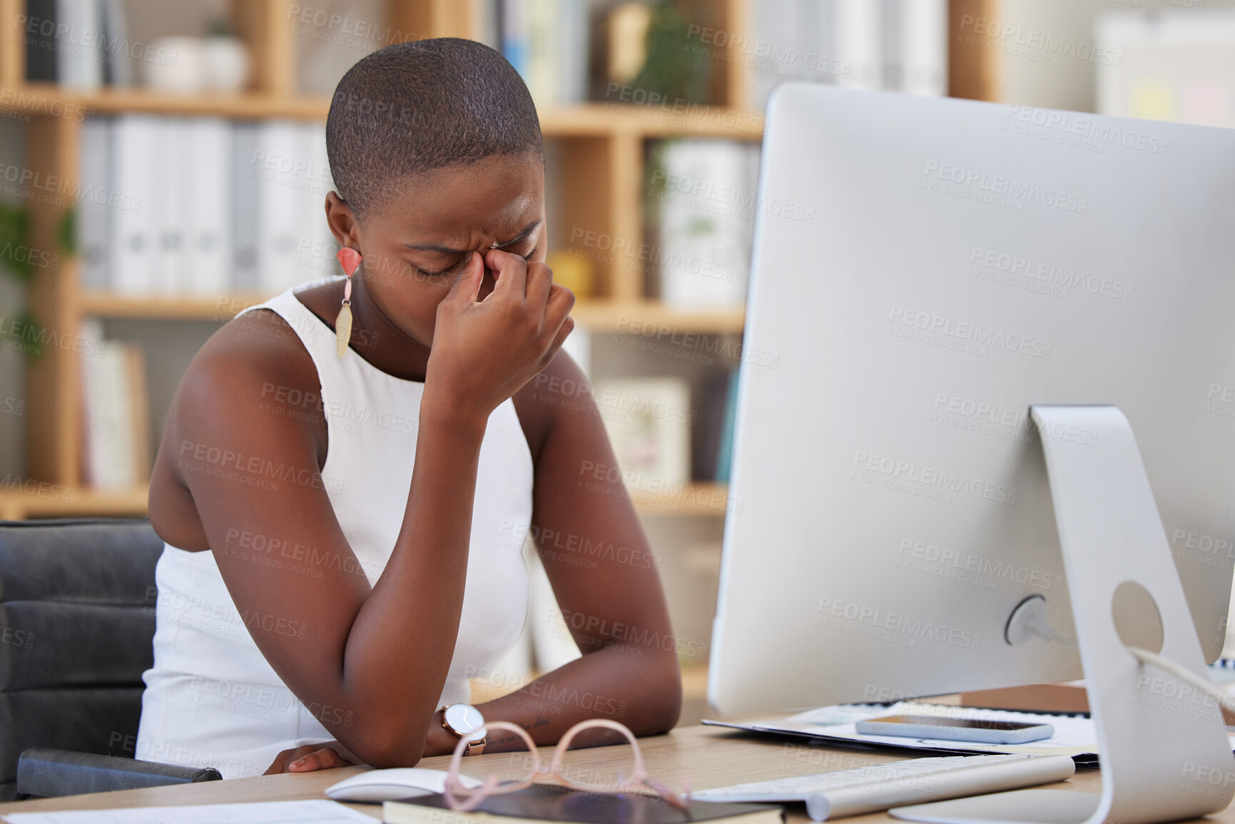 Buy stock photo Headache, migraine and sad woman on computer stress, depression or mental health risk in office for news. Pain, depressed or angry African business person with burnout or fatigue for online career