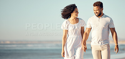 Buy stock photo Walking, travel and couple holding hands at beach for summer holiday, vacation and romantic date. Love, dating and mixed race man and woman enjoying sunset for bonding, relaxing and honeymoon by sea