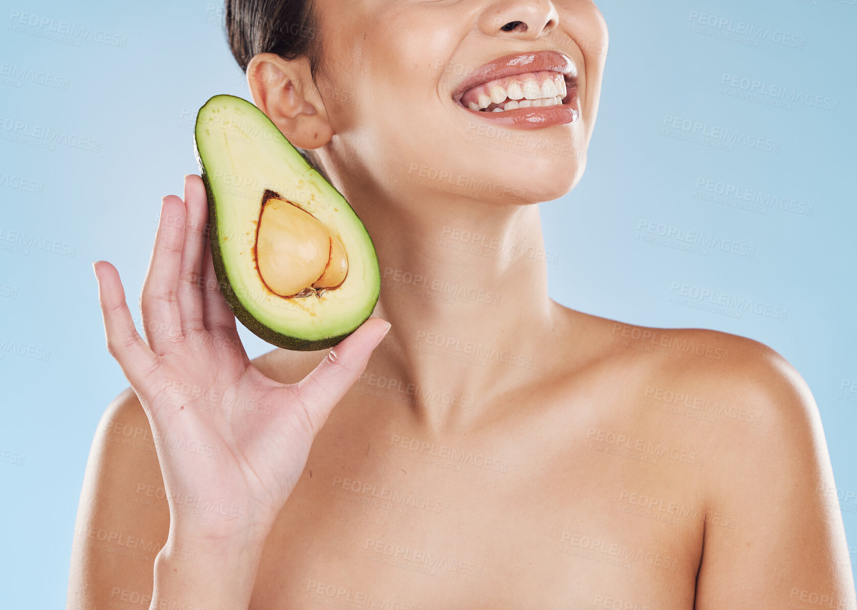 Buy stock photo Beauty, healthcare and skincare woman avocado in hand with cosmetic wellness, health and healthy diet for clean and glowing skin. Happy portrait, smile and young model face, teeth and fruit product