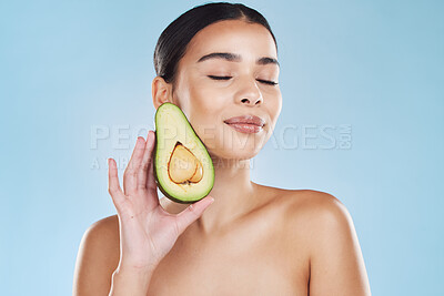 Buy stock photo Natural beauty product, woman skincare wellness and avocado fruit for sustainable face skincare. Food hair mask health, nutrition vegetable diet lifestyle and cosmetic blue background portrait