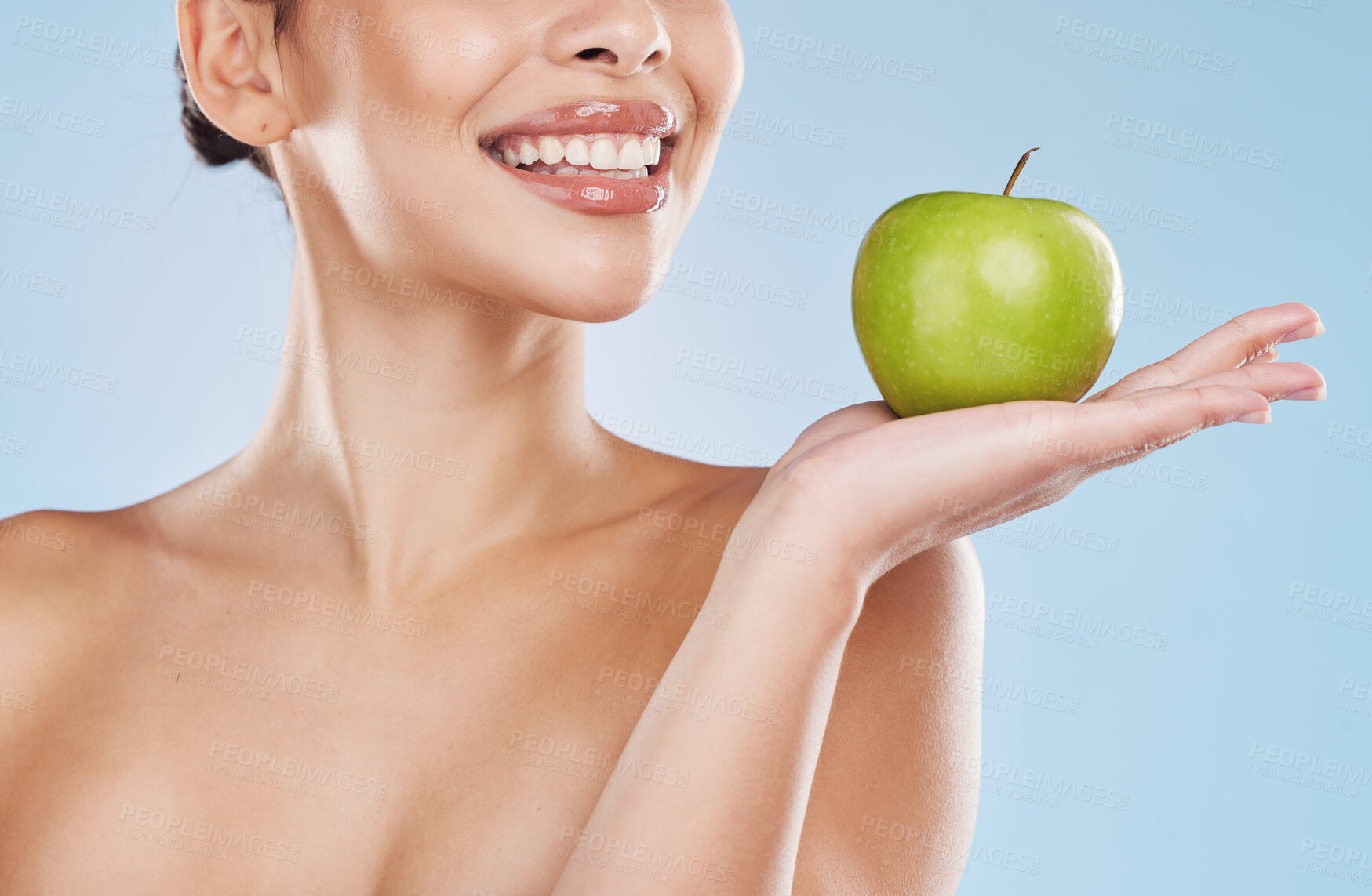 Buy stock photo Health, beauty and woman with an apple and a wellness, healthy and organic lifestyle in studio. Girl with clear skin and fresh skincare routine holding a fruit with vitamins and nutrition for a diet.