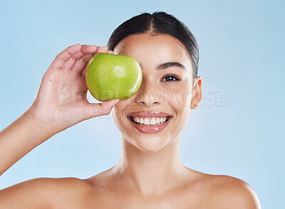 Buy stock photo Apple, beauty and woman in a face skincare portrait showing happy, dermatology and facial health results. Young girl doing detox with natural and organic acne products with fresh fruit nutrition 