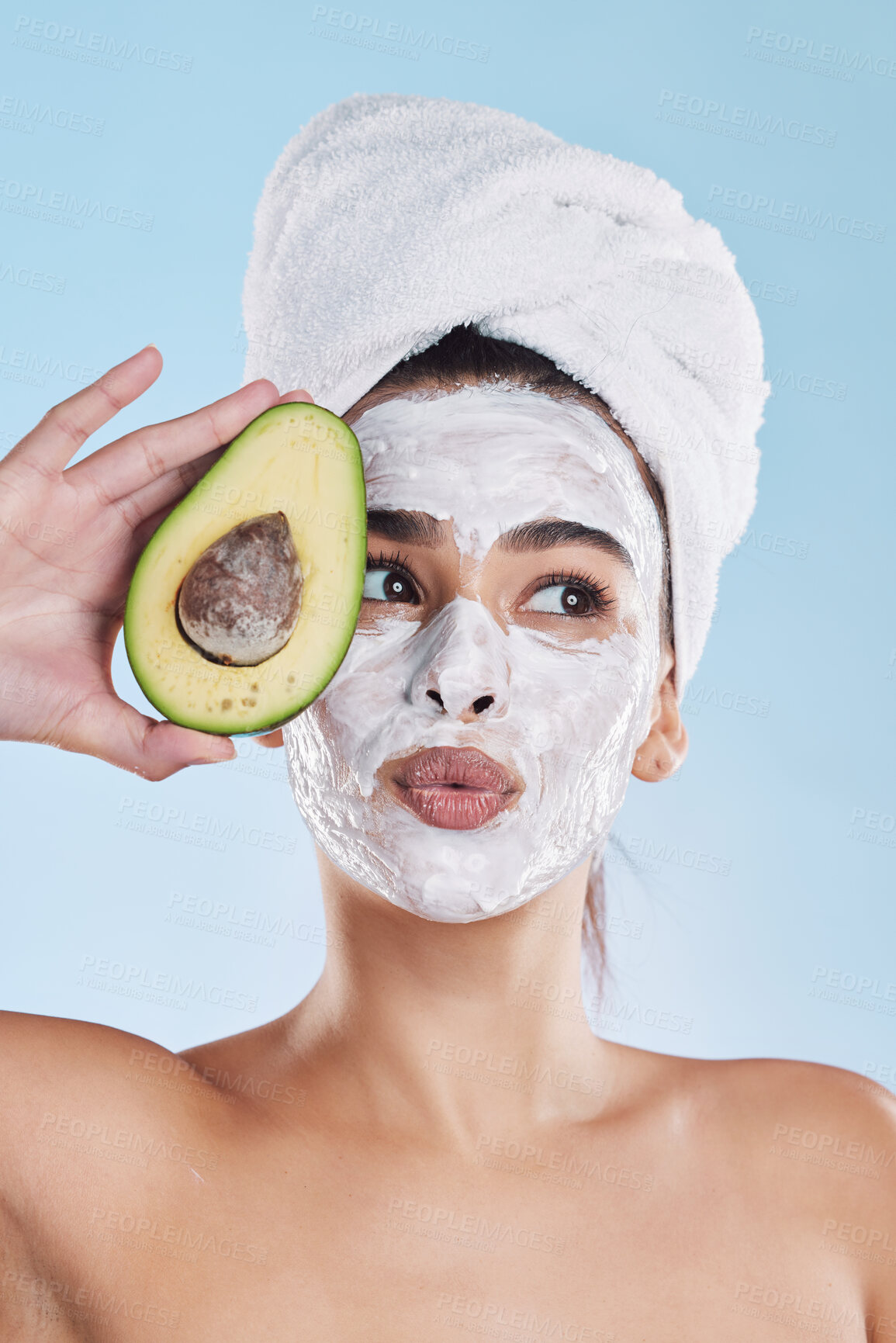 Buy stock photo Beauty, skincare and avocado face mask with a beautiful woman taking care of her clean and healthy skin. Organic, fresh and cleansing facial with routine spa treatment with natural ingredients