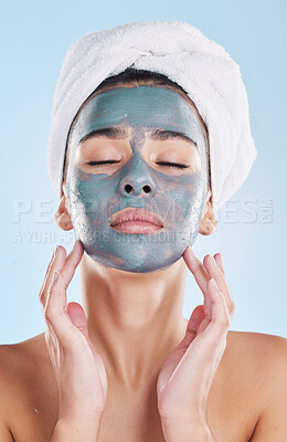 Buy stock photo Skin, charcoal face mask and woman with morning self care routine, facial cleaning product and towel for hygiene skincare. Model with bathroom skin care beauty health on blue studio background mockup