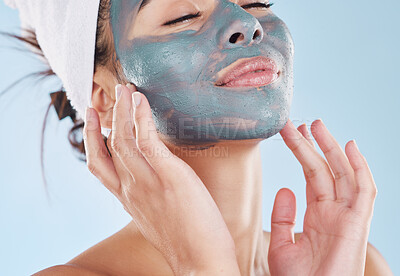 Buy stock photo Charcoal face mask for healthy skincare, wellness of facial skin and beauty product for body care against blue mockup studio background. Mock up of relax, cosmetic and lifestyle model with treatment