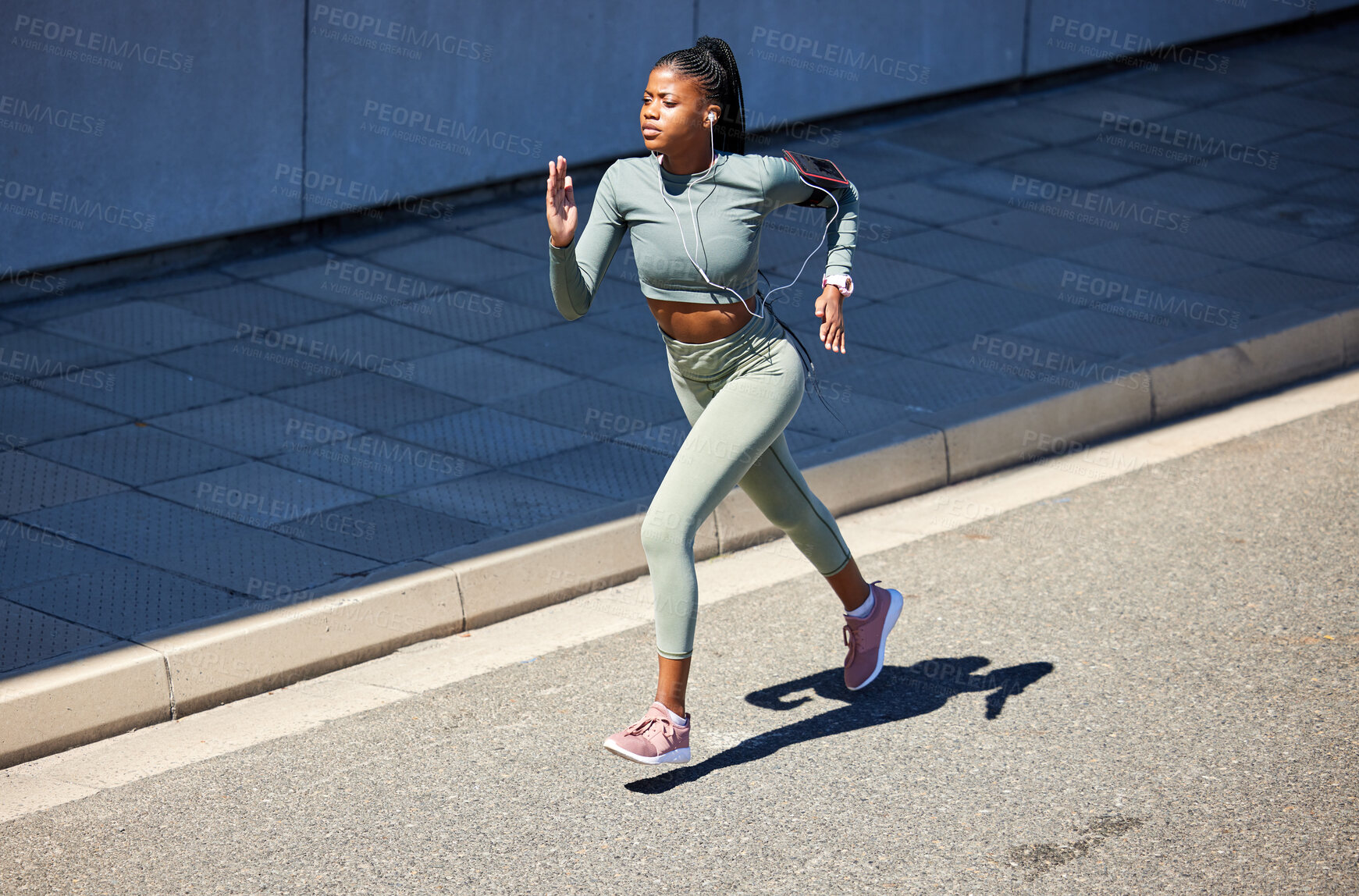 Buy stock photo Running, workout and fast black woman training for a marathon, health and wellness in a city or town street. Healthy, exercise and young person, runner or athlete run with speed for fitness or energy