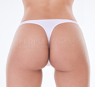 Buy stock photo Rear view of one unrecognizable model posing in underwear against a white background studio. Unknown hispanic female showing her perfect thick shape in a studio