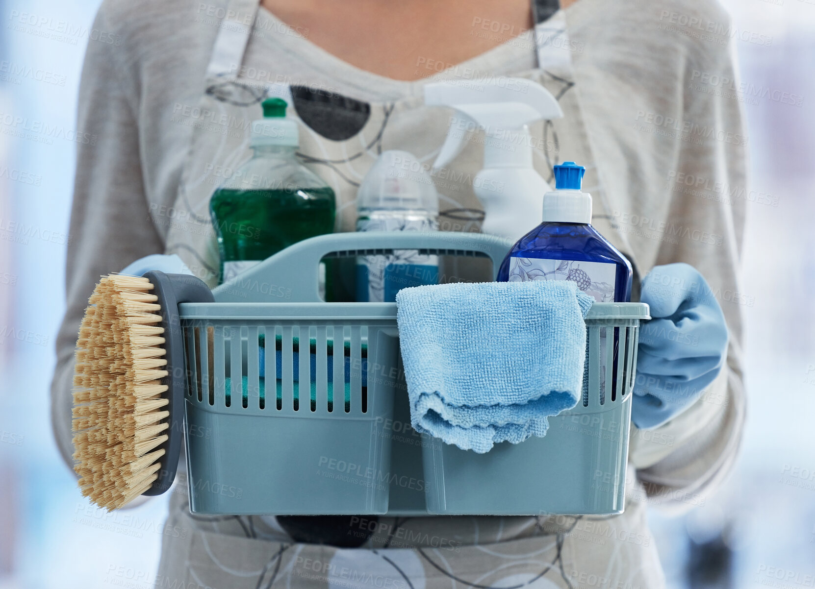 Buy stock photo Hands, basket and product for cleaning home with brush, cloth or chemical for hygiene by blurred background. House, professional cleaner woman or plastic container for services, stop bacteria or dust