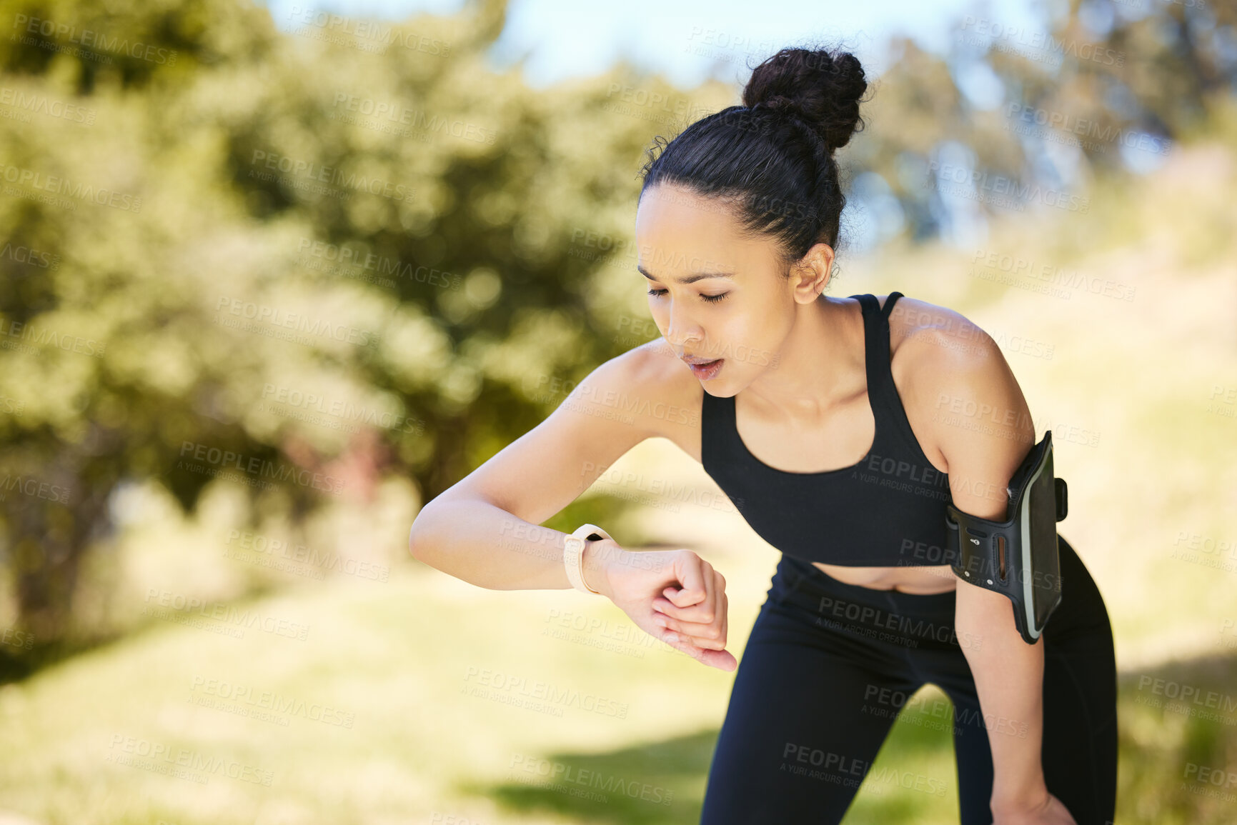 Buy stock photo Woman, fitness and checking watch in rest after running, cardio exercise or workout in nature. Fit or active female person, athlete or runner looking at wristwatch on break for monitoring performance